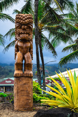 Wood carving of a God