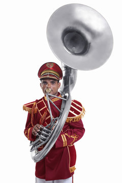 Portrait of a bandmaster playing a sousaphone