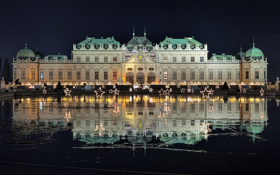 Upper Belvedere Palace with Christmas Village in Vienna in night, Austria