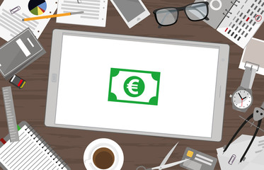 Obraz premium Schreibtisch mit Tablet - Geldschein Euro