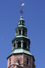 Fototapeta na wymiar Details on Kunsthallen Nikolaj tower in Copenhagen, Denmark