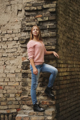 beautiful young girl posing on the street
