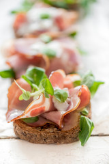 Toast sandwich with Italian prosciutto and cream cheese,selective focus
