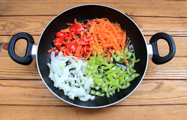 Varied vegetables stewed in a pan with non-stick coating