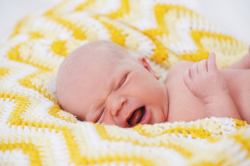 cute newborn baby in the blanket