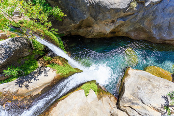 Waterfall in mountain river