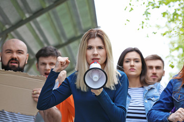 Group of protesting young people outdoors