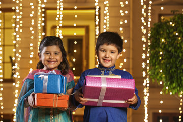 Portrait of children with gifts
