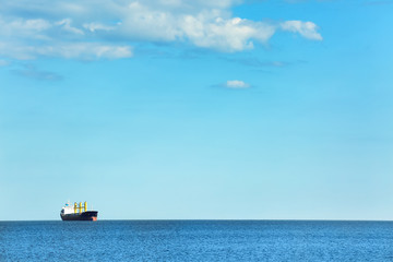 Beautiful seascape with ship on sunny day
