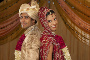 Portrait of newly married Indian couple 