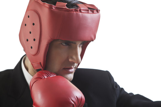Businessman with boxing gloves 
