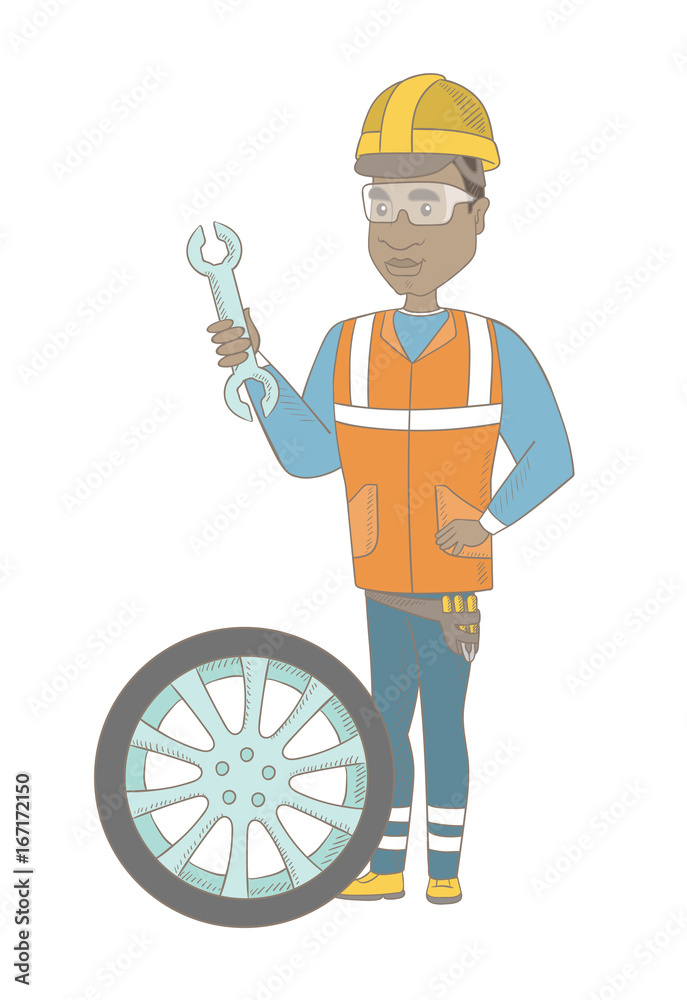 Canvas Prints young african-american mechanic in uniform and hard hat holding spanner and wheel. full length of me