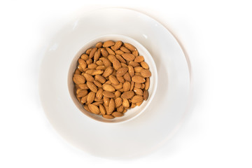 Almonds. Almonds on white table. Almonds background. Group of almonds. Peeled almonds