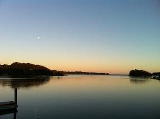 tranquil sunset scene with trees and water
