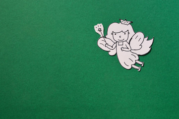 dental paper cut, cute tooth fairy isolated on green