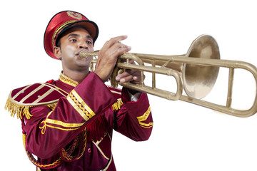 Bandwala playing on a trumpet