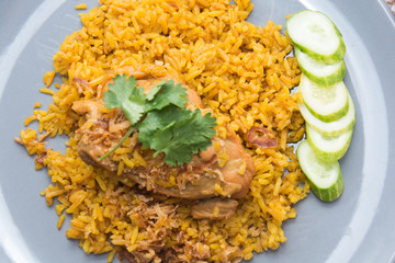 Chicken Biryani with rice and sauce. halal food (Khao Mok Gai)