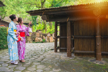 young traveler women wearing kimono clothing
