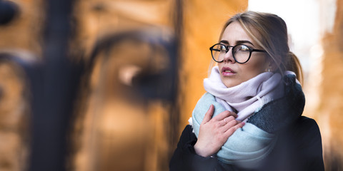 woman in glasses walk autumn morning in sunshine light