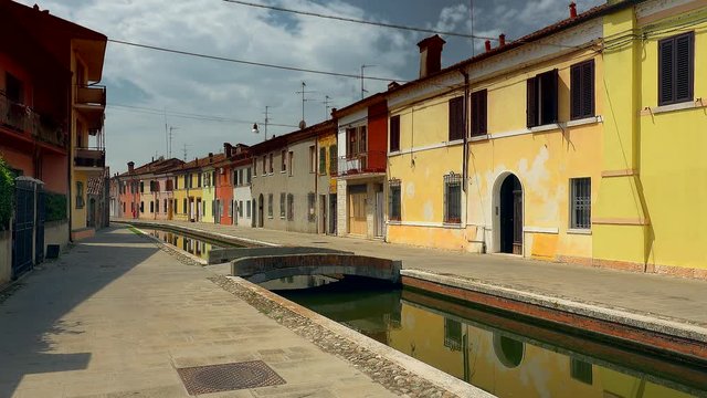 architectural wonder of Italy, colorful houses of the lagoon town of Comacchio, known as The Little Venice, near Ferrara, color graded clip