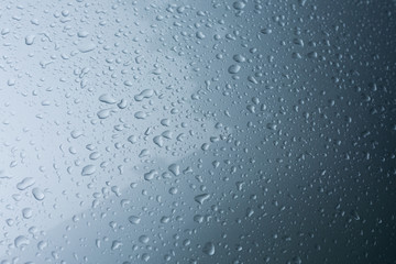 rain drops on car with glass coating protection skin