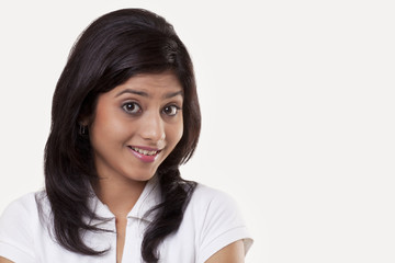 Portrait of a teenage girl with raised eyebrows 