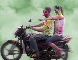 Fototapeta na wymiar Couple riding on a motorcycle 