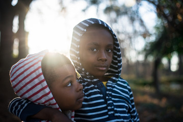 brothers together wearing stripes 