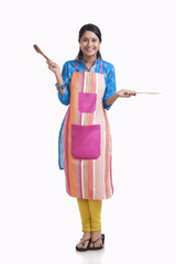 Portrait of a young WOMEN wearing an apron