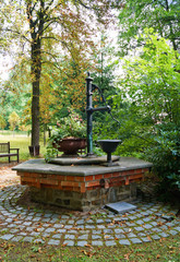 quiet hidden place in garden with old well