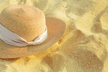 Fototapeta na wymiar Top view of sandy beach with summer accessories
