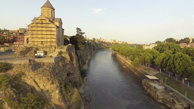 flight over Metekhi church in Tbilisi located on cliff near river Kura. GEORGIA