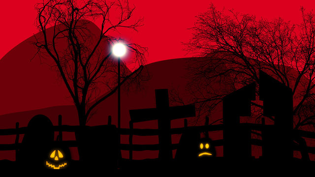 Halloween concept graveyard with pumpkins on red