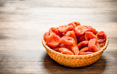 Dried apricots in a bowl.