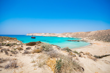 Fototapeta na wymiar Amazing view of Koufonisi island with magical turquoise waters, lagoons, tropical beaches of pure white sand and ancient ruins on Crete, Greece