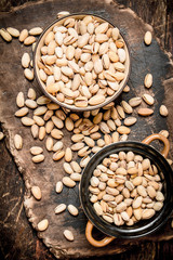 pistachios in a bowl on the Board.