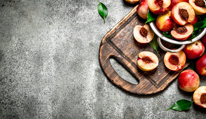Fresh peaches in a bowl.