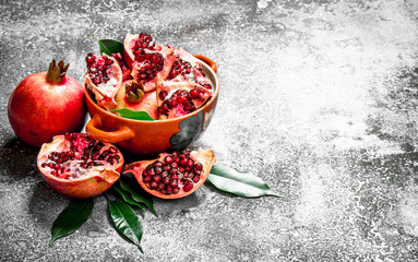 Pieces of fresh pomegranate in a bowl.