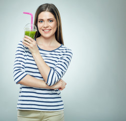 Smiling woman holding sport cocktail in glass