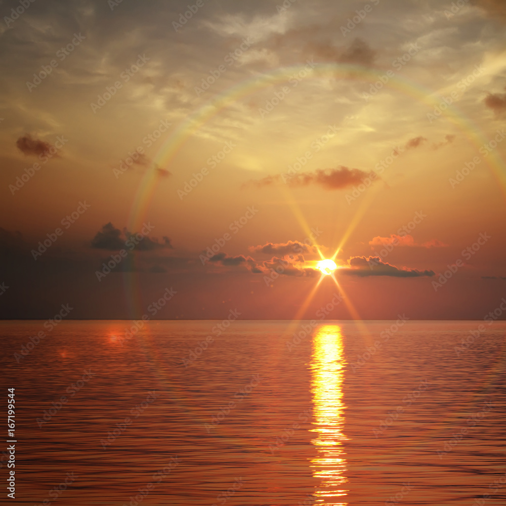 Wall mural orange sunset at the sea with deep horizon