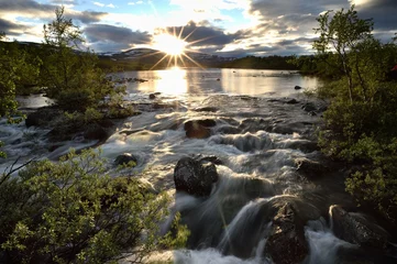 Foto op Aluminium River rapids in Lapland at sunset with mountains in the background, Malla National Reserve, Siilasjoki, Siilasjärvi © Erik Mandre