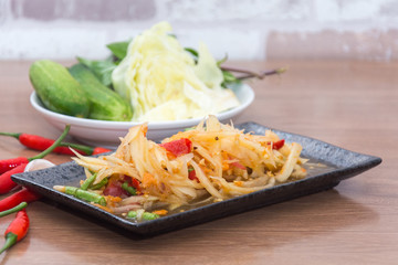 papaya salad (som tum thai) on plate