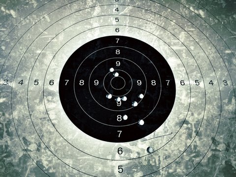 Bull eye target with bullet hole, grunt style color tone