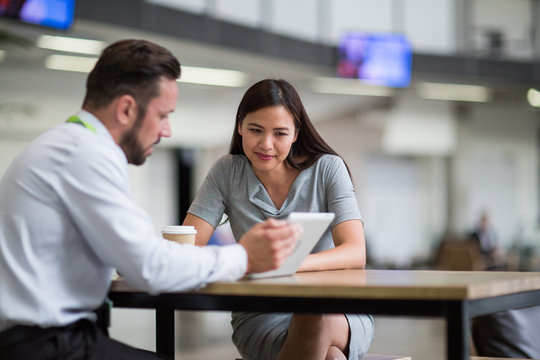 Businesswoman listening to a presentation