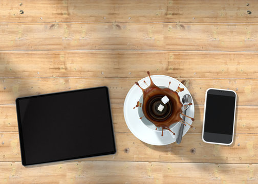 wooden table with tablet on it and two cubes of shugar falling into a coffee cup