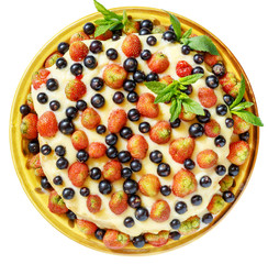 Homemade cake with strawberries and currants