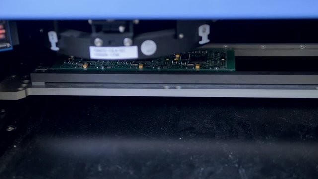 Optical sensors provide quality control for circuit boards. 