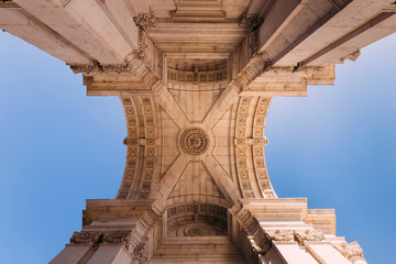 Columns holding an arch in Praca de Comercio in Lisbon, Portugal