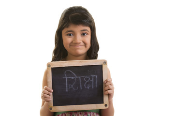 Girl holding black board