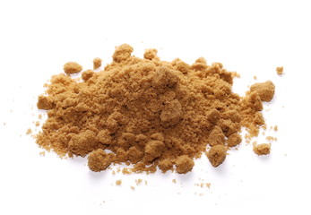 Unrefined light brown cane sugar isolated on white background